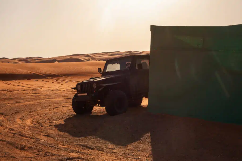 Black jeep in the desert